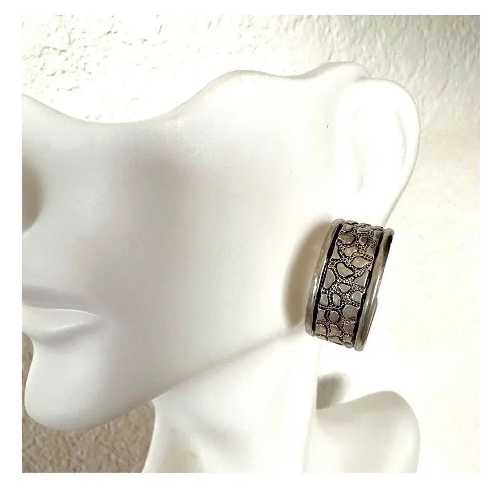 Silver tone hoop earrings